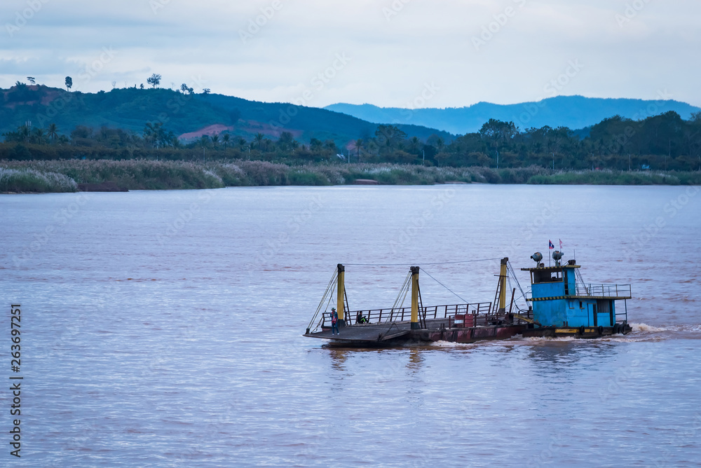 Floating boat on the Mekong River.Thailand.
