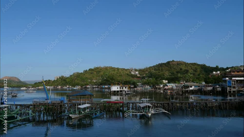 Traditional banga boats at port of Coron, Philippines, time lapse Traditional banga boats at port of Coron, Philippines, time lapse