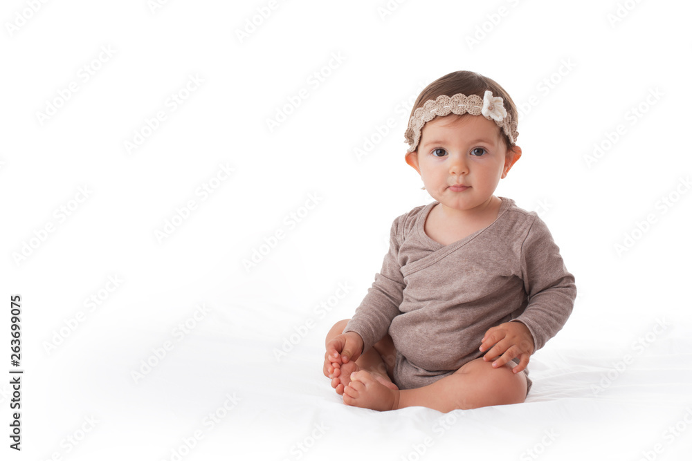 Cute baby girl playing with his legs portrait Cute baby girl playing with his legs portrait