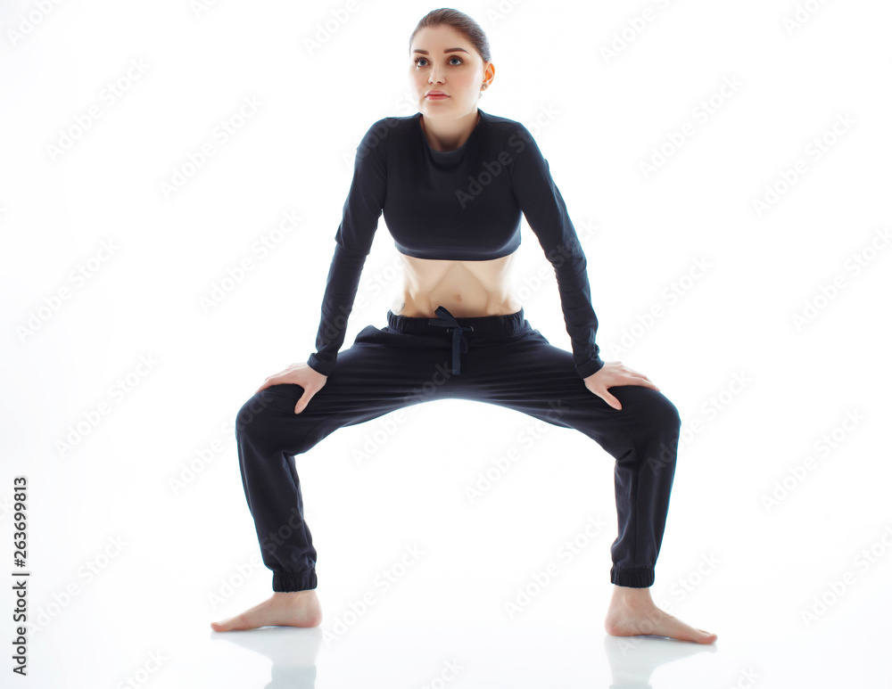 A woman makes a stomach vacuum. A woman makes a stomach vacuum.