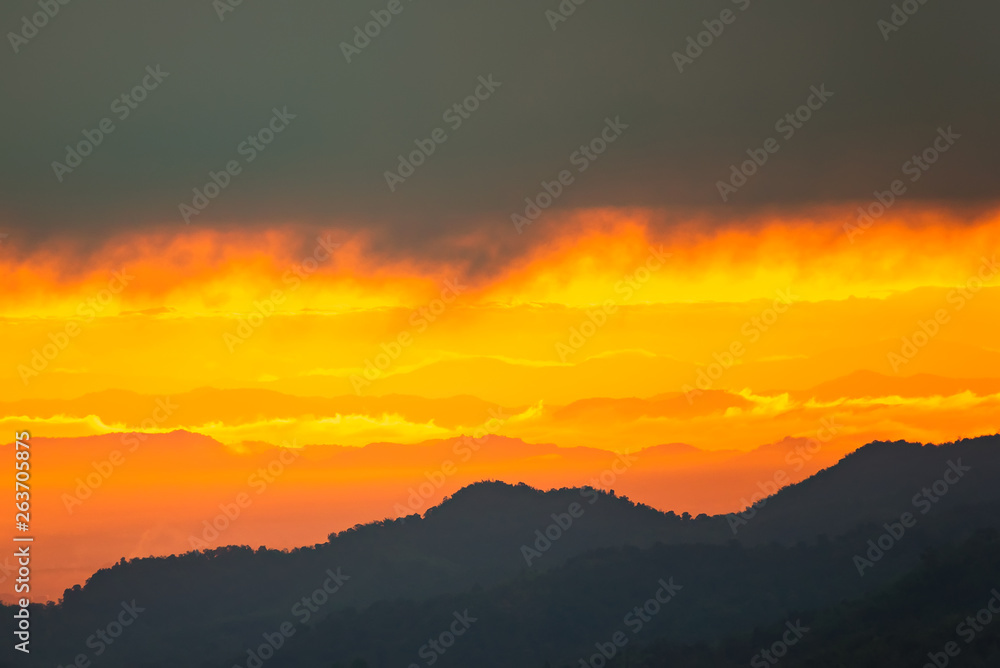 Sunrise.Mountain valley during sunrise. Natural summer landscape.Lighting before sunrise at the morning time.Thailand.