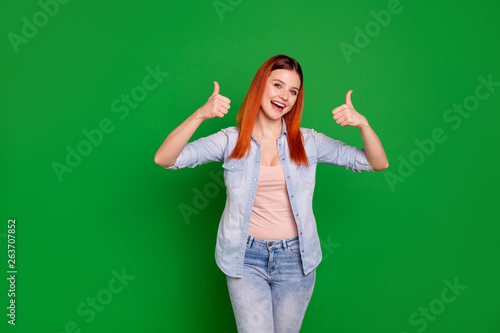 Close up photo beautiful funky she her foxy lady hold hands arms fingers thumbs up advising buy buyer black friday best quality low price wear casual jeans denim shirt isolated green bright background