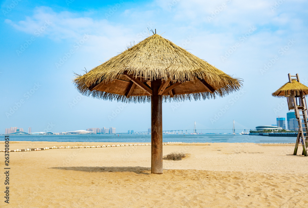 Thatched pavilion on the beach in Sands Bay, Zhanjiang