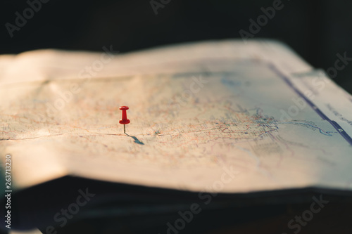 Putting pins to  destination on map. Plan travelling and relax with holiday concept.