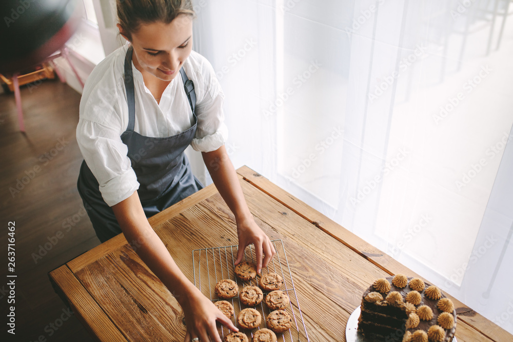 © Jacob Lund - Female pastry chef preparing cookies © Jacob Lund - Female pastry chef preparing cookies