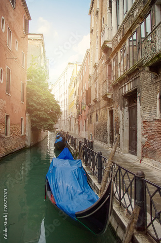 Venetian gondola canal waters of Venice Italy. Street in water c