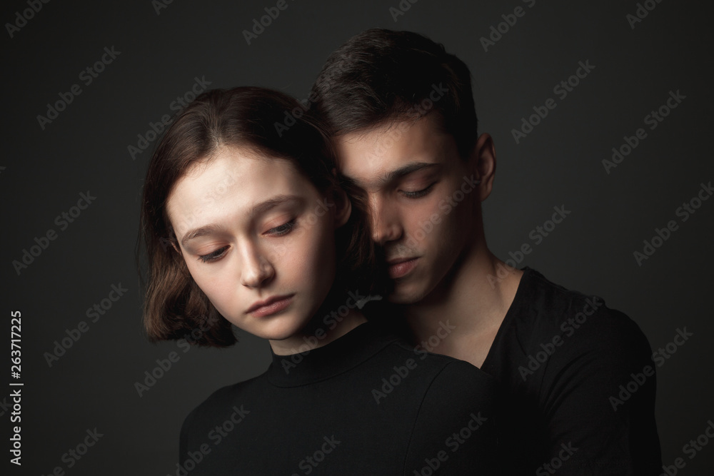Young woman and young man in studio. Young woman and young man in studio.