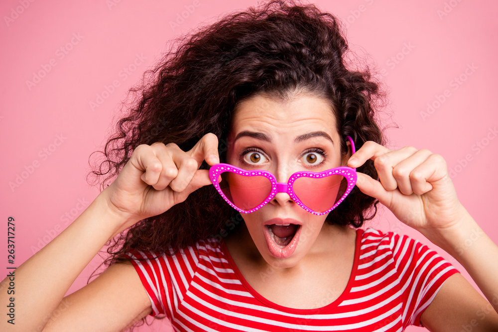 Close-up portrait of her she nice-looking attractive fascinating adorable lovely cheerful cheery wavy-haired lady putting glasses off opened mouth isolated over pink pastel background Close-up portrait of her she nice-looking attractive fascinating adorable lovely cheerful cheery wavy-haired lady putting glasses off opened mouth isolated over pink pastel background