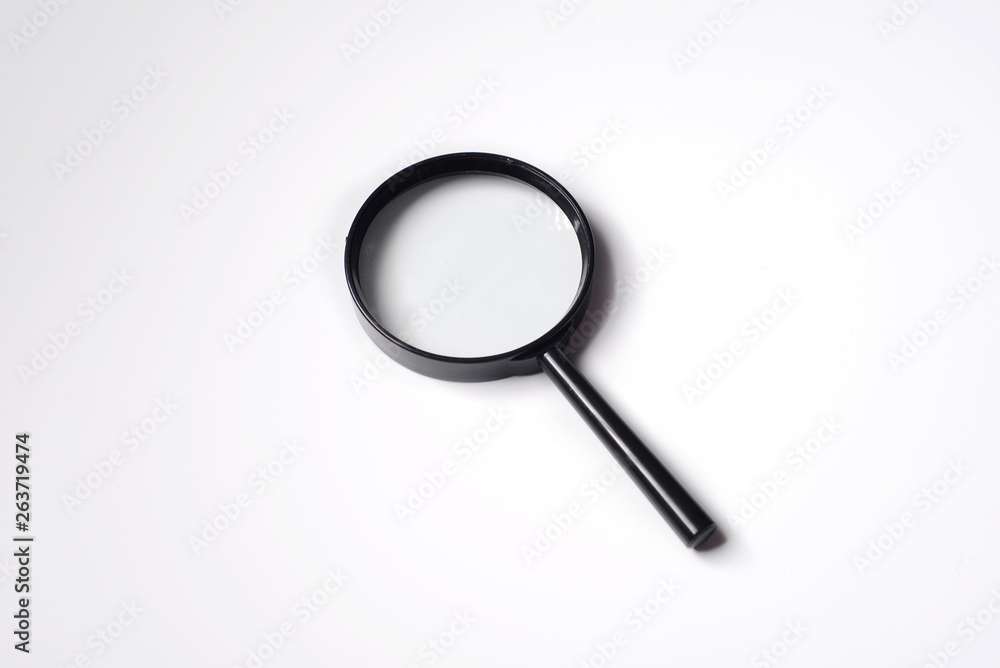 Office tools , Magnifying glass on white background Office tools , Magnifying glass on white background