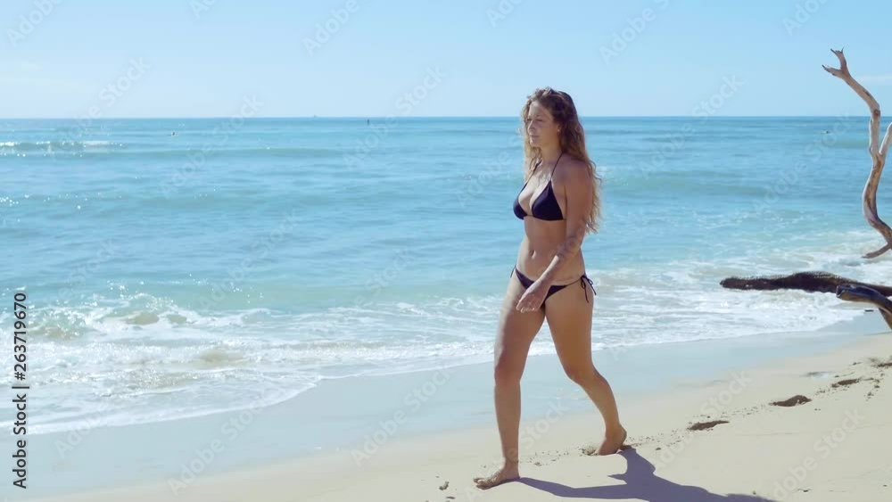 Beach Travel Woman Carefree Walking on Perfect Vacation Beach. Beach Travel Woman Carefree Walking on Perfect Vacation Beach.