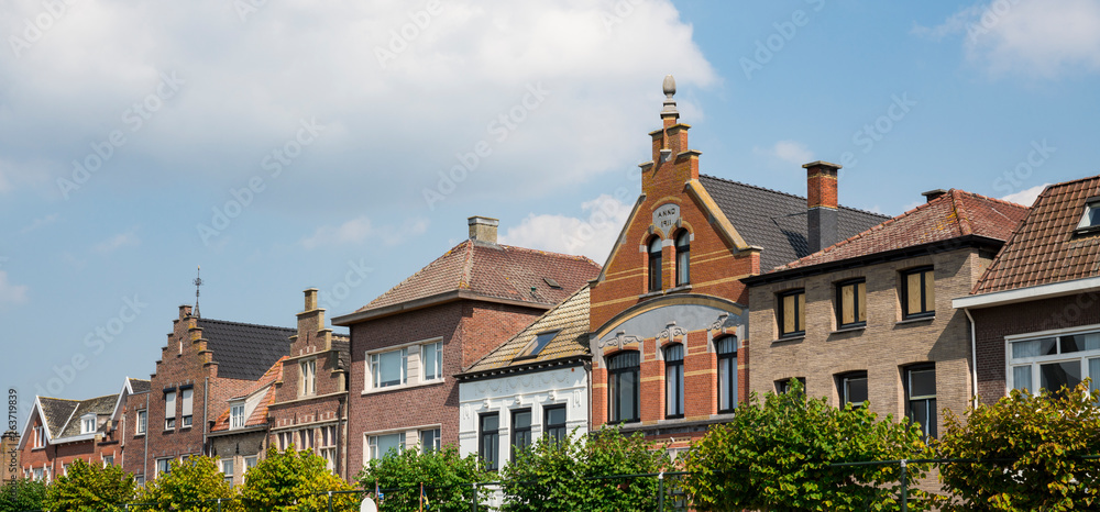 row stepped gable houses in Sas Van Gent, The Netherlands. Banner Stock  Photo | Adobe Stock