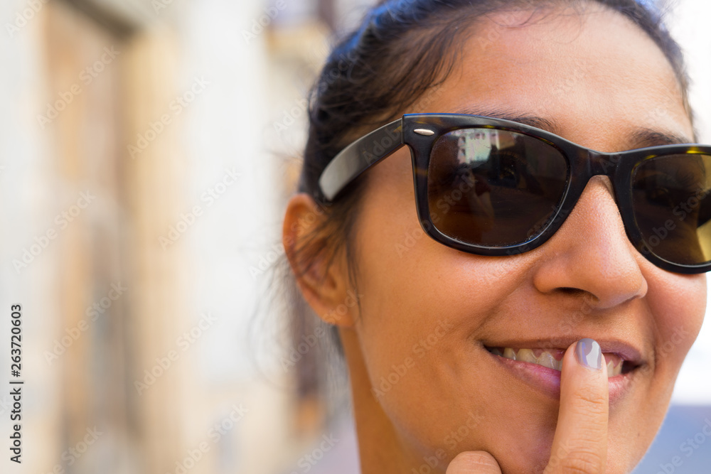 Young indian woman thinking and having a idea Young indian woman thinking and having a idea
