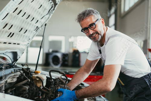 working in car service