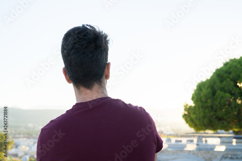 young man looking away
