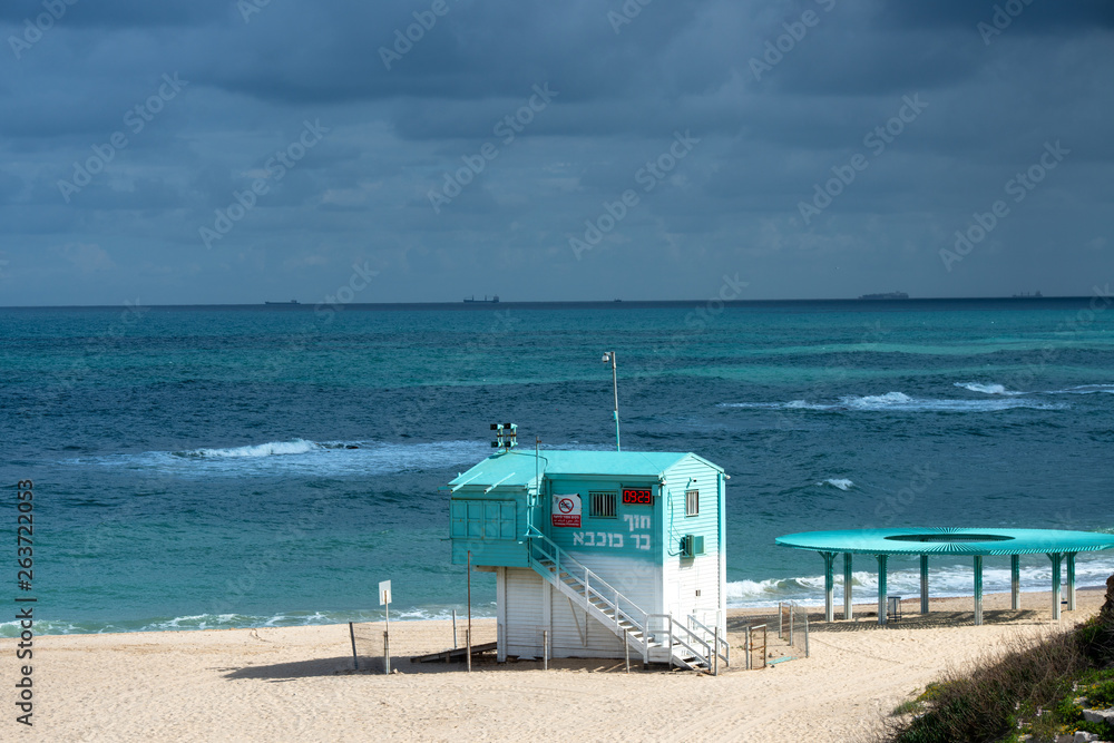 Rescue point and solar wooden canopy on the beach. Rescue point and solar wooden canopy on the beach.