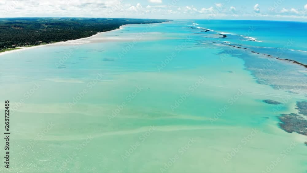 Aerial Forward: Stunning Tropical Landscape with Bright Blue Ocean in Porto de Galinhas, Brazil Aerial Forward: Stunning Tropical Landscape with Bright Blue Ocean in Porto de Galinhas, Brazil
