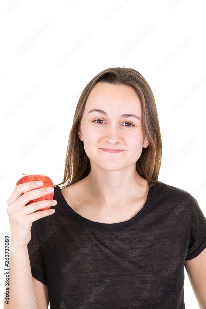 pretty smiling happy young woman with red apple in hand pretty smiling happy young woman with red apple in hand