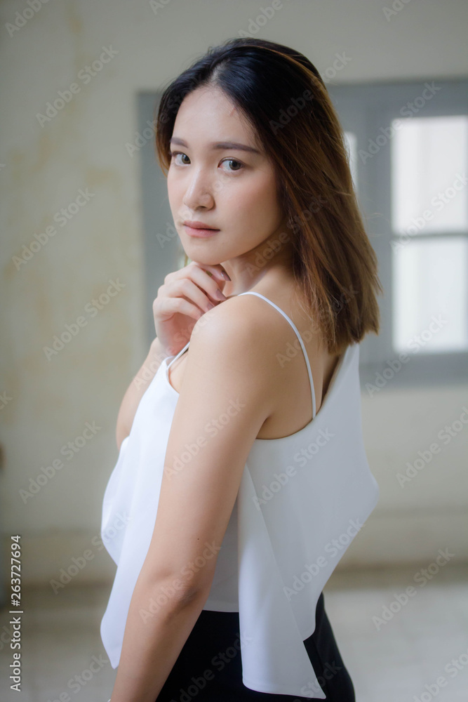 Portrait of thai adult beautiful girl relax and smile Portrait of thai adult beautiful girl relax and smile