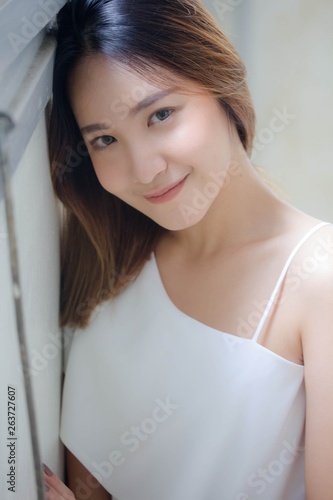 Portrait of thai adult beautiful girl relax and smile