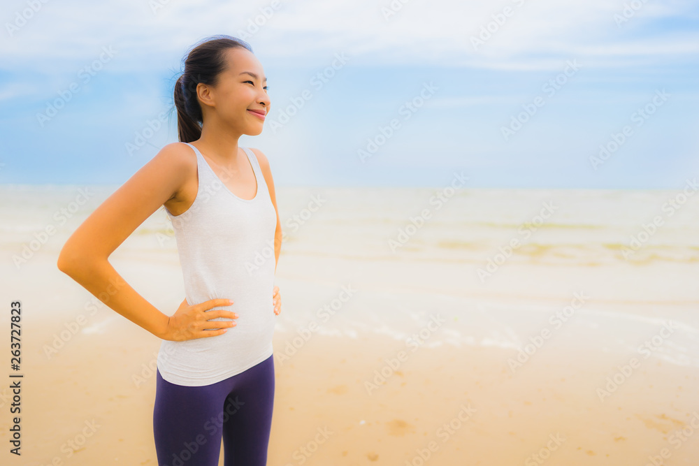 Portrait beautiful young sport asian woman exercise by run and jogging on the outdoor nature beach and sea Portrait beautiful young sport asian woman exercise by run and jogging on the outdoor nature beach and sea