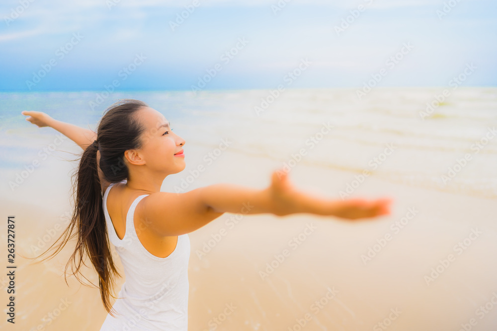 Portrait beautiful young sport asian woman exercise by run and jogging on the outdoor nature beach and sea Portrait beautiful young sport asian woman exercise by run and jogging on the outdoor nature beach and sea