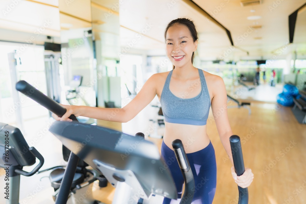 Portrait asian woman exercising and work out in gym