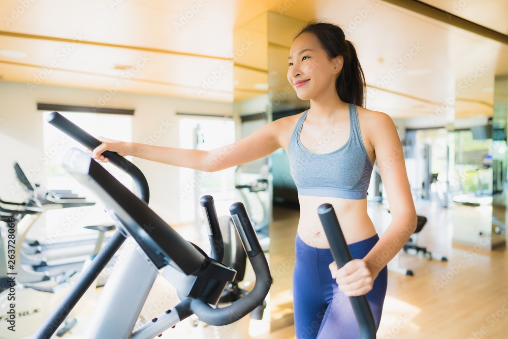 Portrait asian woman exercising and work out in gym Portrait asian woman exercising and work out in gym