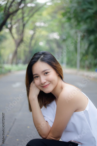 Portrait of thai adult beautiful girl relax and smile