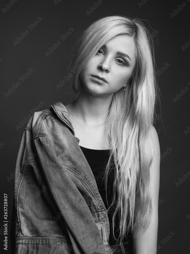 Young woman with beautiful blonde hair. Black and white