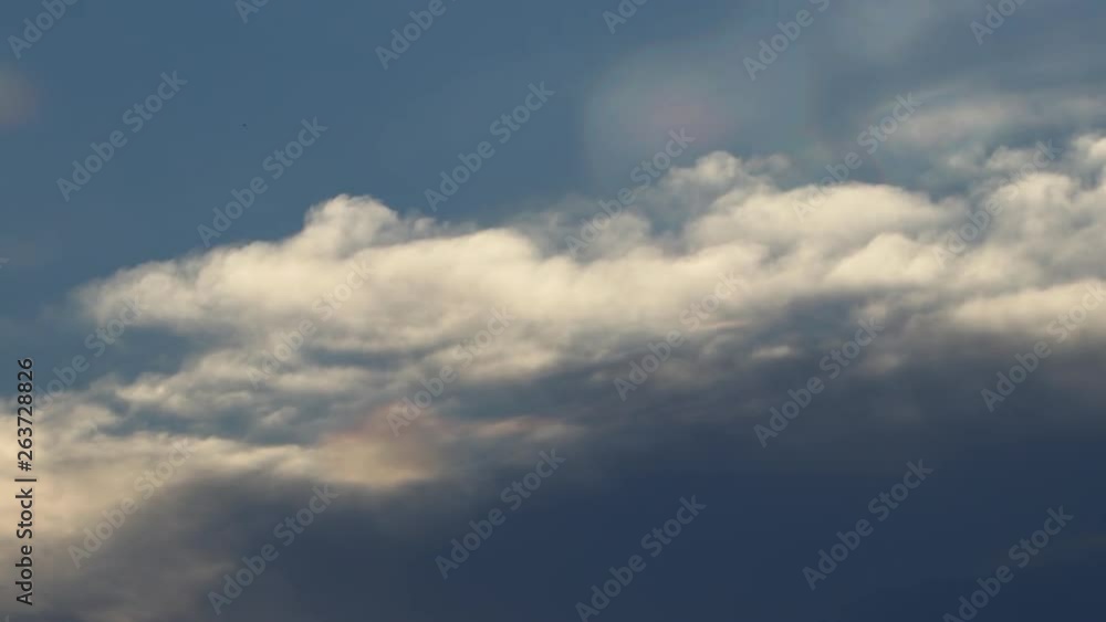 Time lapse clouds, rolling puffy cloud are moving, white lightnes clouds time lapse. Cloud running across the blue sky. Timelapse of white clouds with blue sky in background. Time lapse clouds, rolling puffy cloud are moving, white lightnes clouds time lapse. Cloud running across the blue sky. Timelapse of white clouds with blue sky in background.