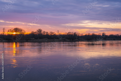 Evening sky above Vistula River seen from a bank in Wasaw, Poland