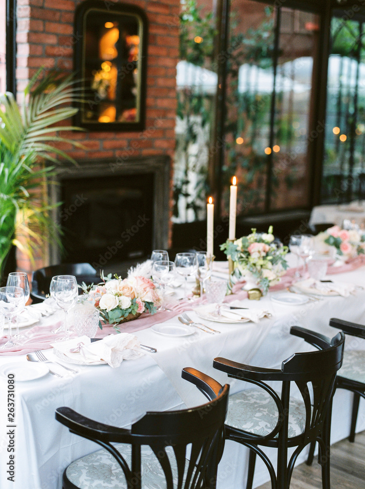 Table settings for a luxury wedding. Outdoor wedding Table settings for a luxury wedding. Outdoor wedding