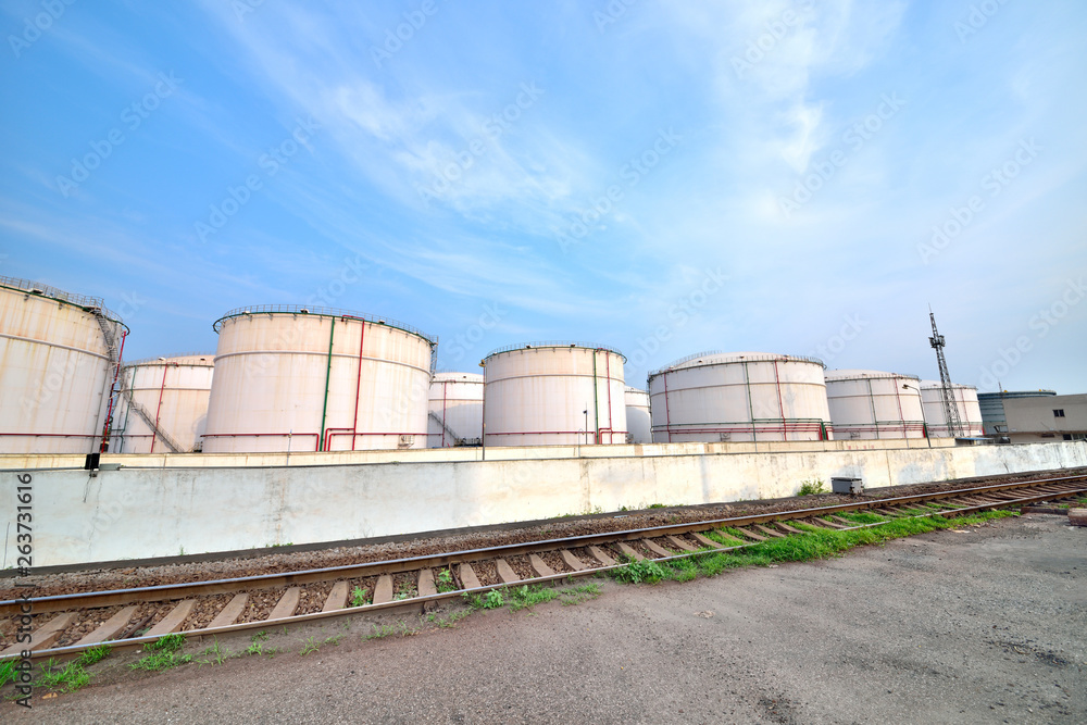 Big white gasoline and oil industry background of railway transportation of storage tanks