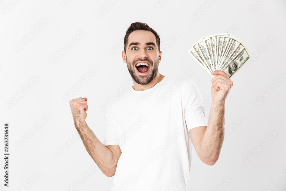 Handsome cheerful man wearing blank t-shirt Handsome cheerful man wearing blank t-shirt