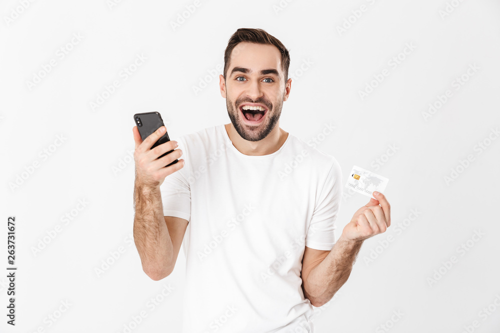 Handsome cheerful man wearing blank t-shirt Handsome cheerful man wearing blank t-shirt