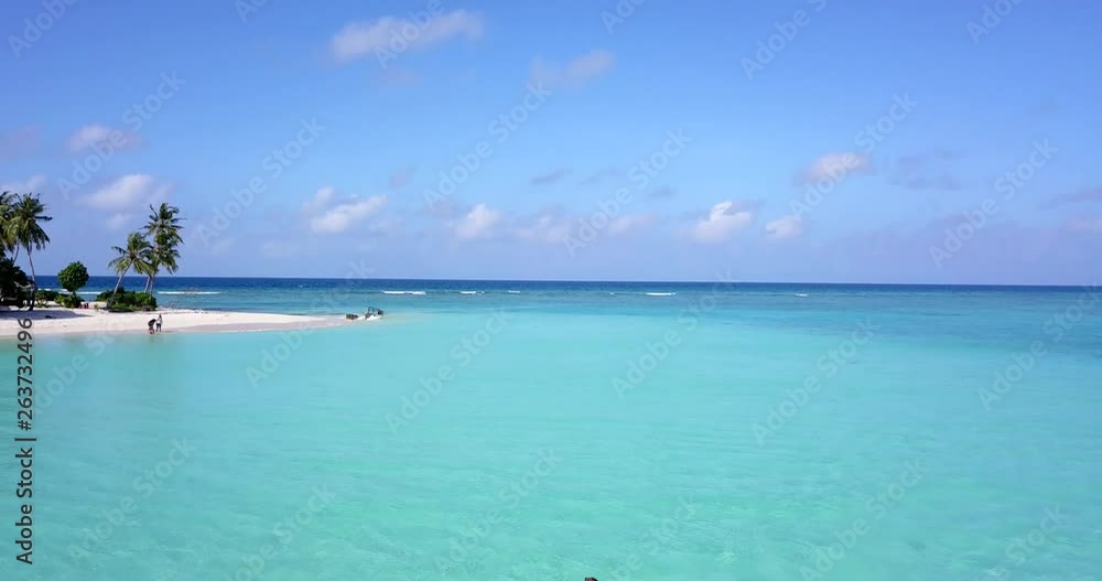 Man and woman in tandem ocean kayak at luxury resort in Maldives 4k Man and woman in tandem ocean kayak at luxury resort in Maldives 4k