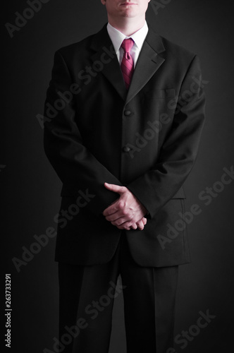 Young Businessman in Suit and Tie - Business © IdeaBug, Inc.