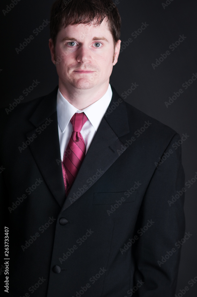 Young Businessman in Suit and Tie - Business Young Businessman in Suit and Tie - Business