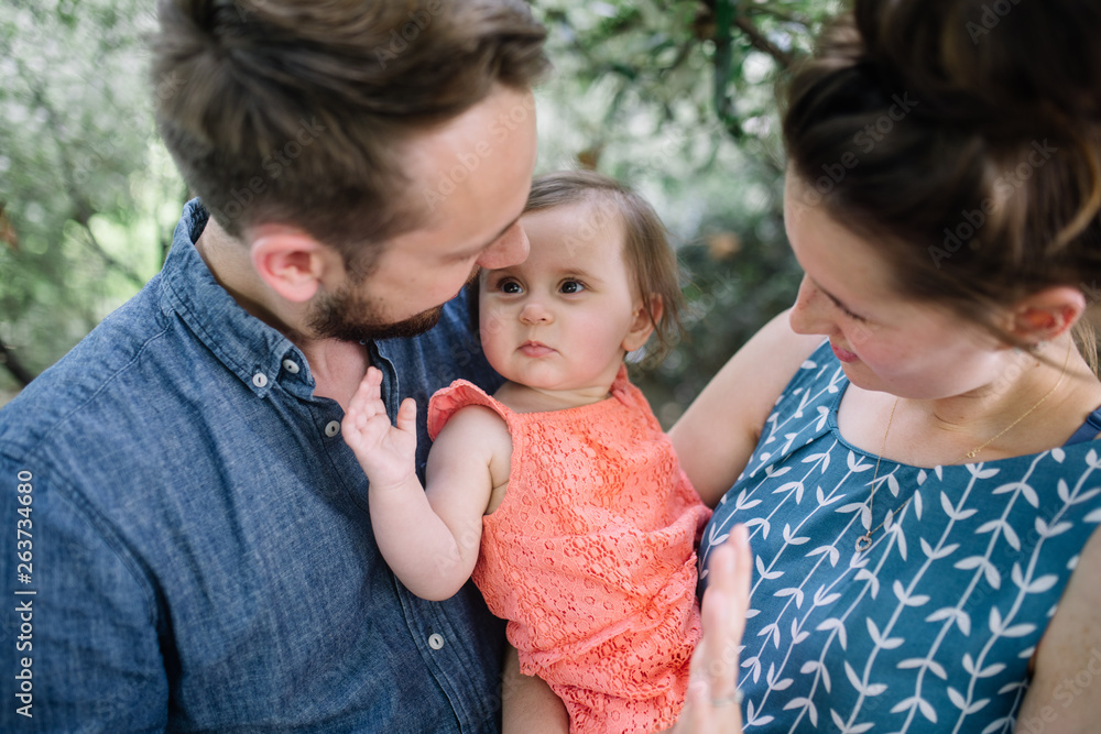 Baby looking at father as a family Baby looking at father as a family