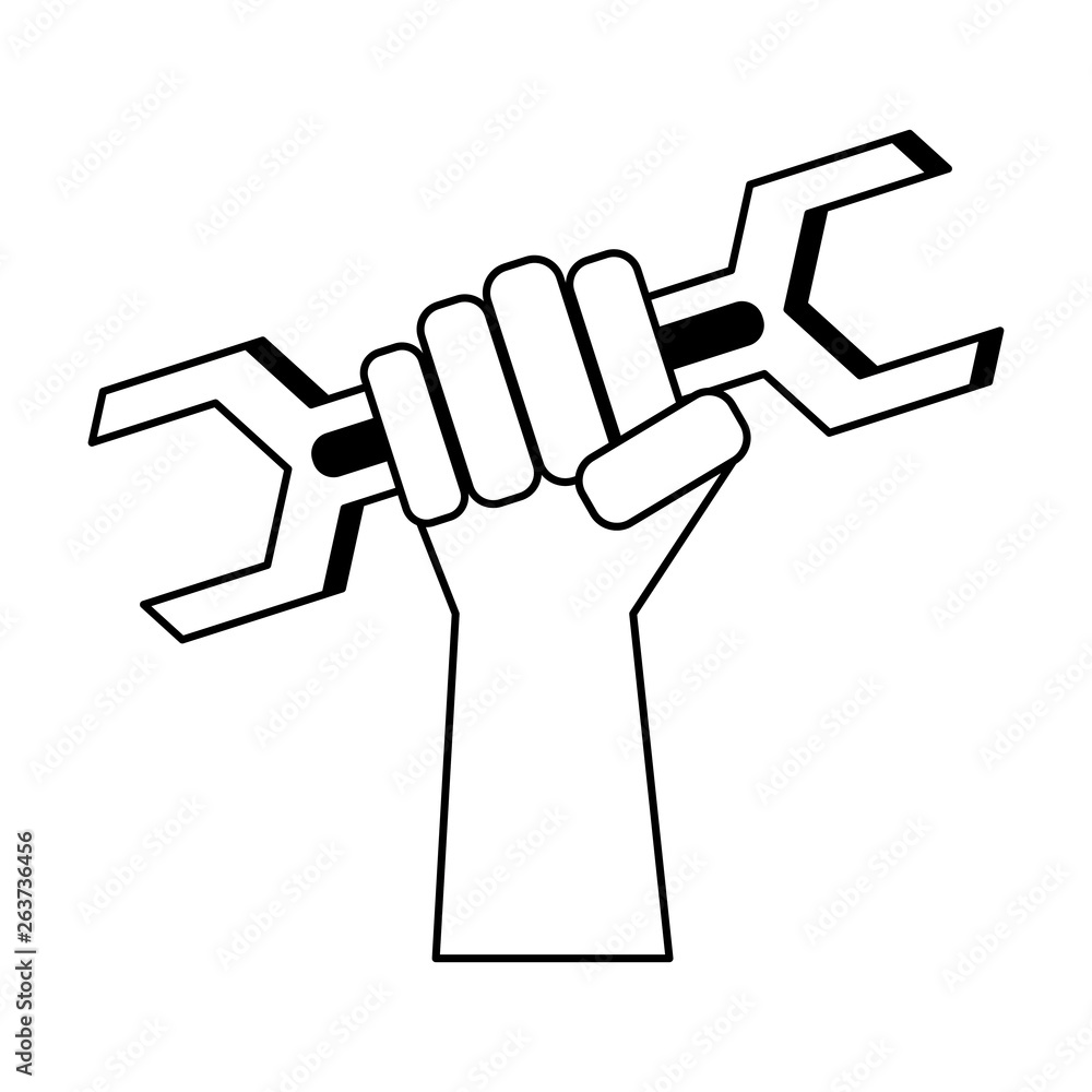 Hand holding wrench construction and repair in black and white