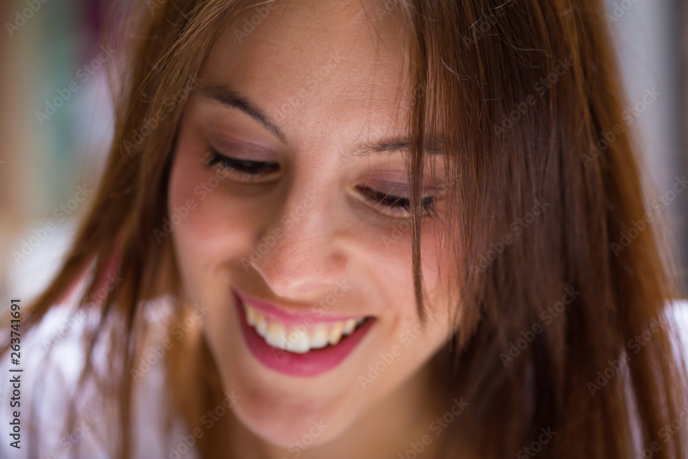 young woman smiling in the city young woman smiling in the city