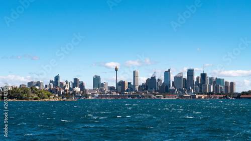 Sydney city skyline seen from the sea on a sunny day
