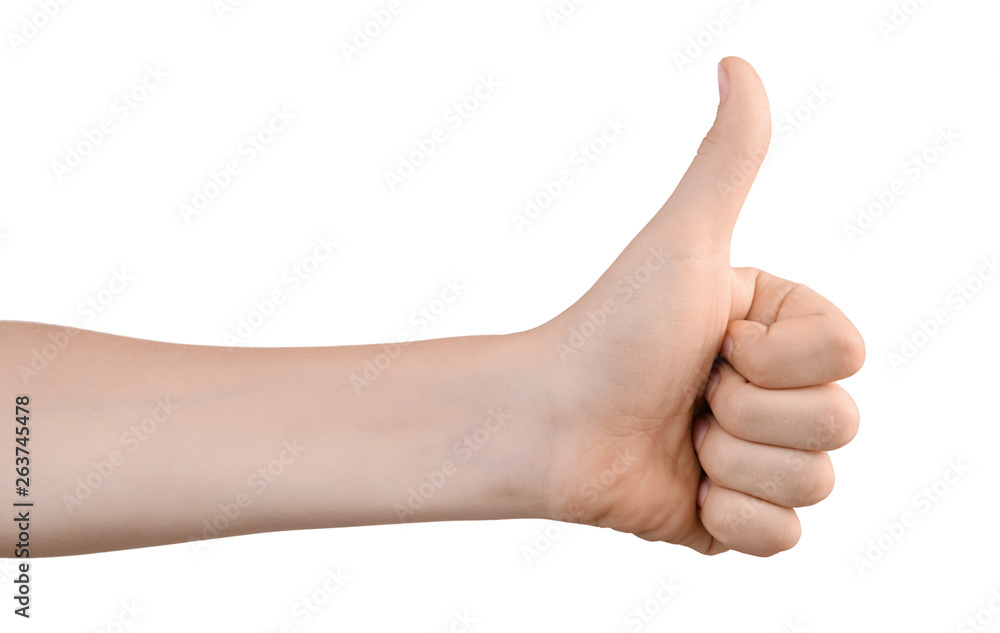 The boy's left hand shows thumb up for OK sign. Hand shows a gesture of approval. Everything is cool, everything is OK. Isolated on white. Success concept.