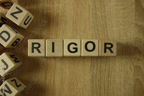 Bild auf Leinwand Rigor word from wooden blocks on desk