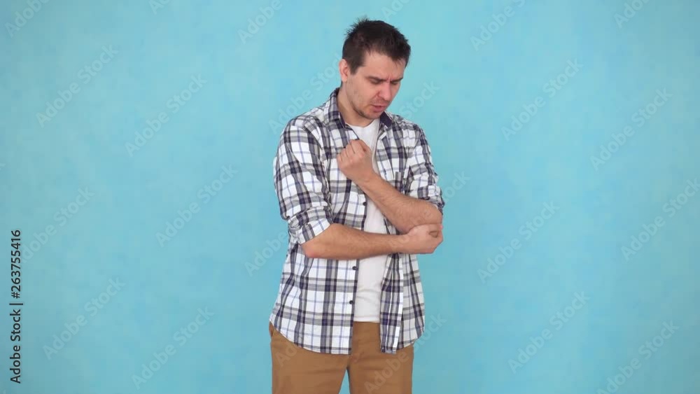 middle-aged man problems and pain in the elbow joint middle-aged man problems and pain in the elbow joint