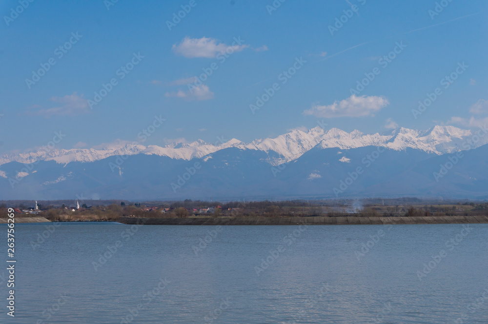 Olt River Panorama with Carpathian Mountains in background