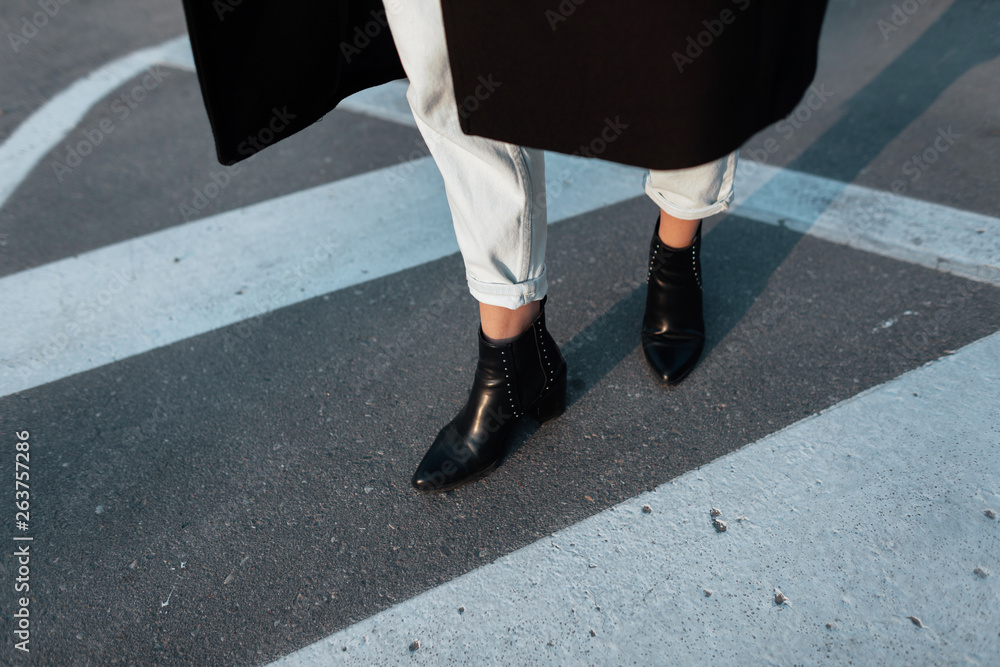 Details Of Womens Clothes And Shoes On A Street Stock Photo