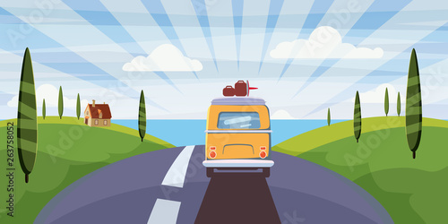Travel van camper, bus on the road goes to the sea for a summer vacation. Holiday season vacation at sea
