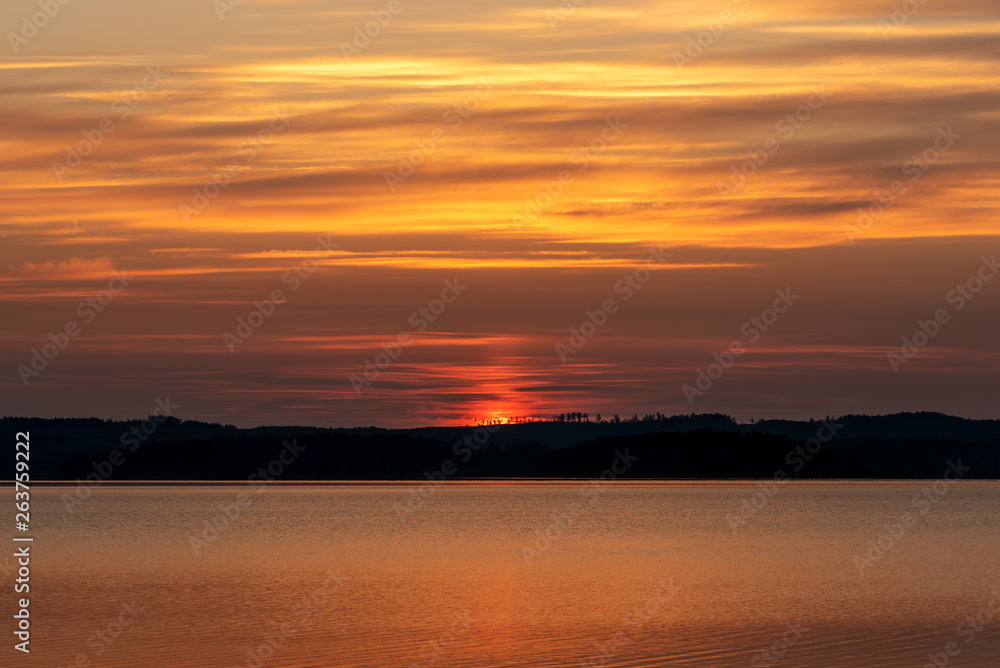 Colorful sunrise over lake