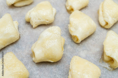 Cottage cheese cookies are on a baking sheet before cooking in the oven